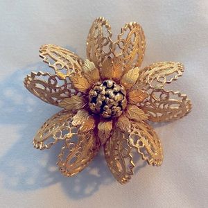 Vintage MONET Goldtone filagree brooch